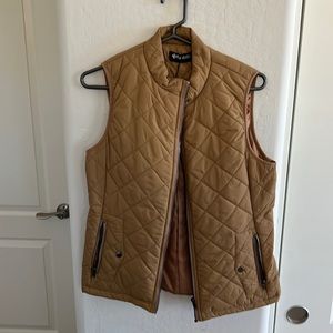 Brown puff vest.